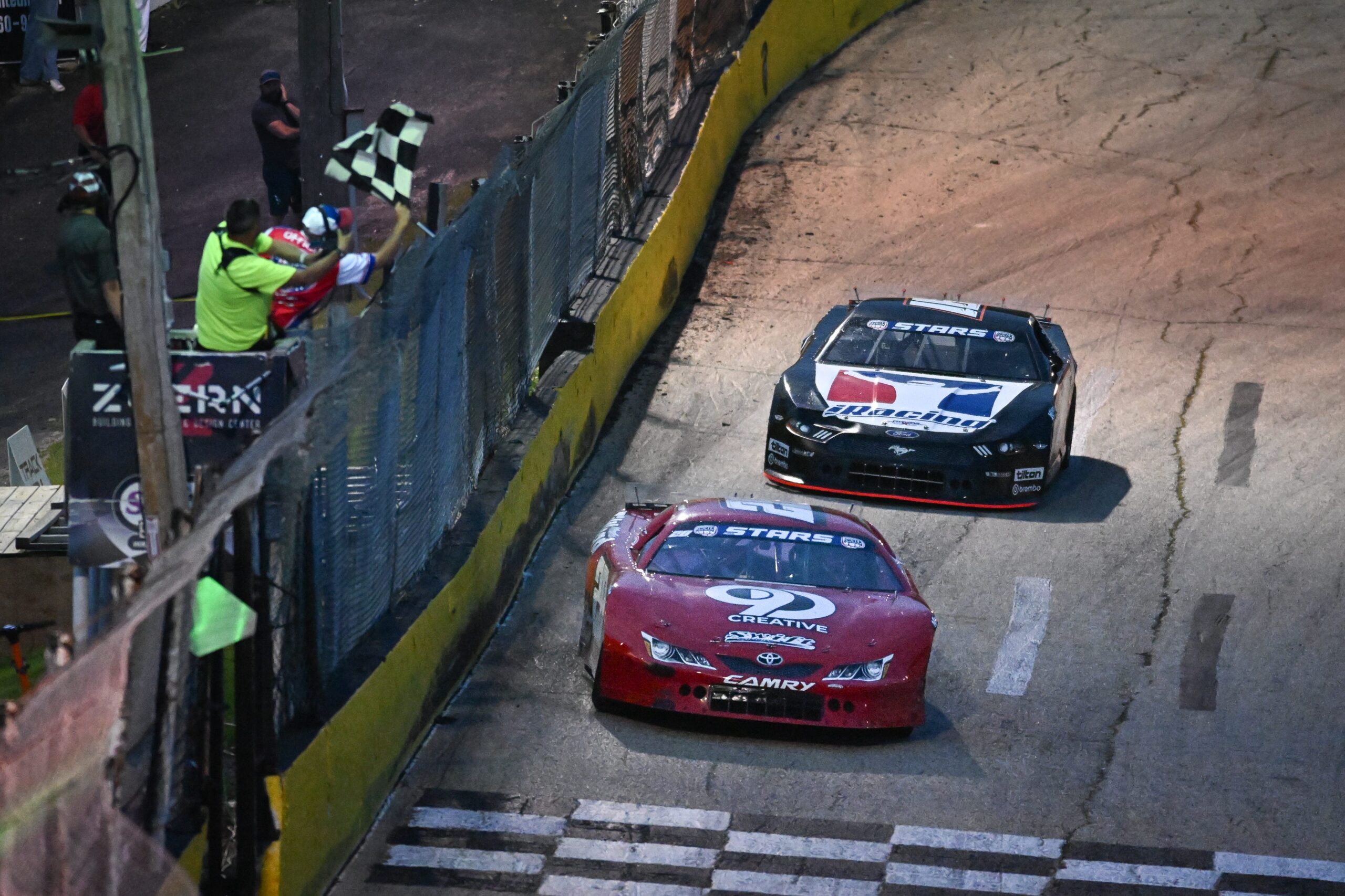 Cole Butcher and Ty Majeski battled for an ASA STARS win at Slinger and the newcomer won