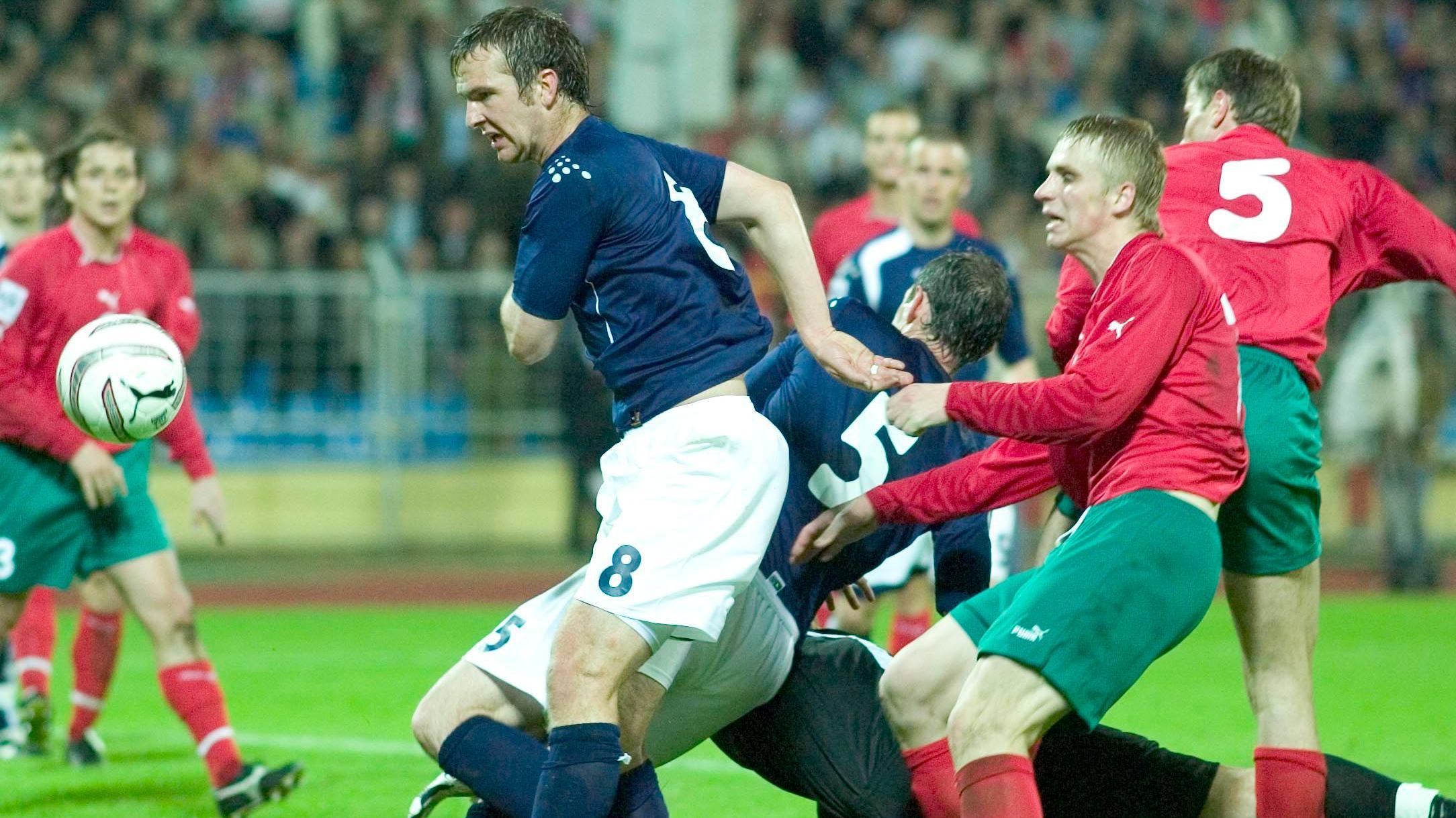Why will Scotland be playing Belarus in Hungary?
